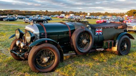 Vintage Bentley Racer on Sunset Field in Crisp 5K Detail wallpaper
