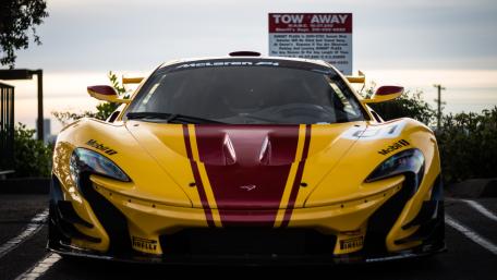 McLaren P1 Front View in Bold Yellow and Red Racing Livery wallpaper