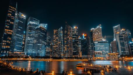 Singapore Skyline at Dusk with Glittering Skyscrapers over the Waterfront wallpaper