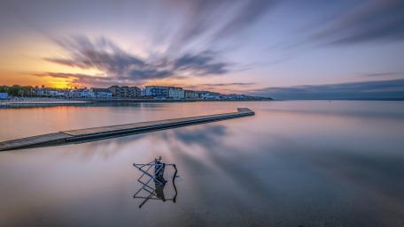 Dawn Reflections Over Marine Lake West Kirby Waterfront wallpaper