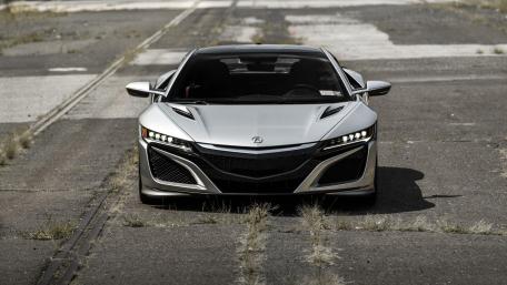 Silver Acura NSX Front View on Weathered Tarmac wallpaper