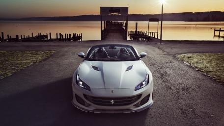 Ferrari Portofino Supercar at Sunset Lakeside Pier in 4K wallpaper