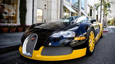 Black and Yellow Bugatti Veyron Supercar Street Showcase wallpaper