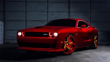 Red Dodge Challenger SRT Hellcat In Shadowy Industrial Garage wallpaper