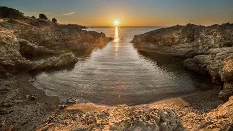 Sunset Calm Over Cala Bramant Bay on the Costa Brava wallpaper