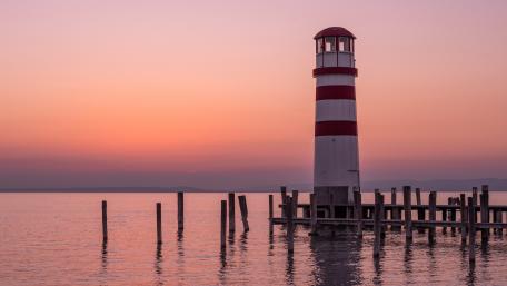 Podersdorf Lighthouse Sunset Over Tranquil Lake Neusiedl Pier wallpaper