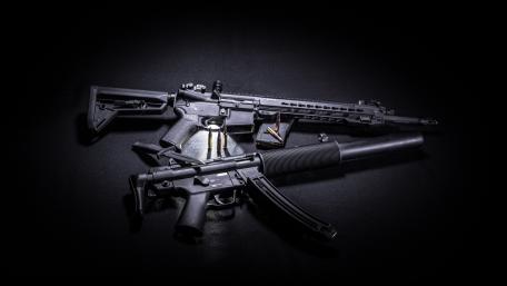 Tactical Firearms on Dark Surface Ultra Sharp 4K Military Wallpaper wallpaper