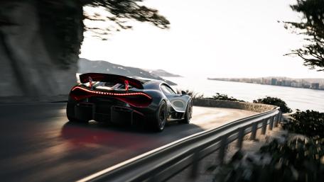 Bugatti Tourbillon Supercar Racing Along a Coastal Mountain Road in 4K wallpaper
