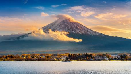 Majestic Mountain Under Golden Skies wallpaper