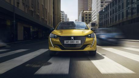 Peugeot 208 Charging Through the City in Crisp 4K Detail wallpaper
