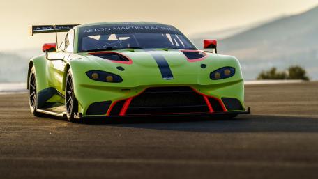 Lime Green Aston Martin Racing Supercar on Track in 4K wallpaper