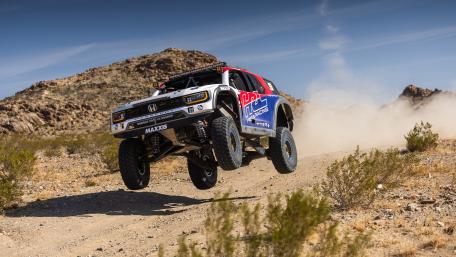Honda Off Road Racer Flying Through Baja Desert Dust in 4K wallpaper
