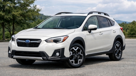 Pearl White Subaru Compact SUV Ready for Mountain Roads wallpaper