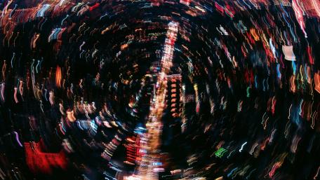 Spiraling Night Lights in Abstract Urban Vortex wallpaper