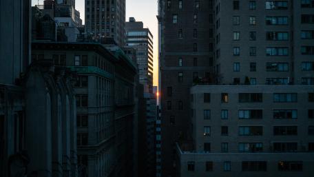Sunset Slice Between Skyscrapers in a Quiet Metropolis wallpaper