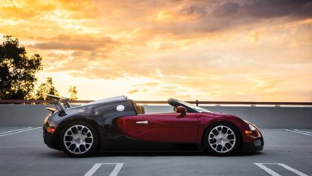 Bugatti Veyron Grand Sport Silhouette at Golden Sunset Rooftop wallpaper
