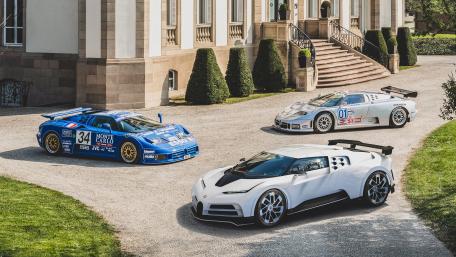 Bugatti Centodieci and Heritage Supercars in a Grand Courtyard 4K Wallpaper wallpaper