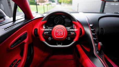 Bugatti Chiron Interior in Red Leather and Carbon Fiber 4K Wallpaper wallpaper