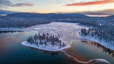 Frozen Islands at Dawn in Finnish Lakeland Taipalsaari wallpaper