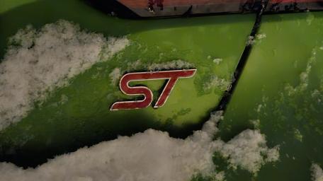 Snowy Ford Fiesta ST Emblem Close Up Performance Detail Wallpaper wallpaper