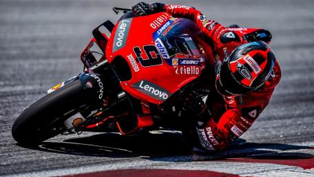 Ducati MotoGP Rider Carving a Perfect Apex at Full Lean wallpaper