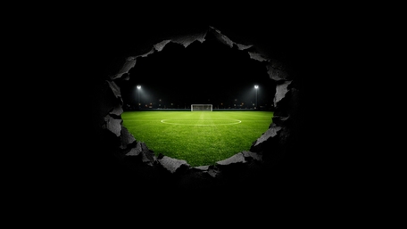 Portal to the Night Football Pitch Under Stadium Lights wallpaper