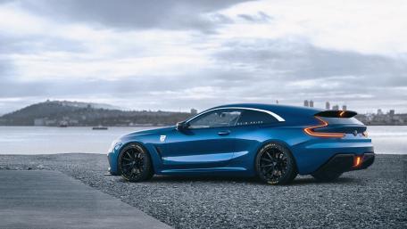 Blue BMW M8 Widebody Coupe Under Dramatic Cloudy Skies wallpaper