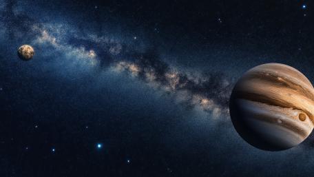 Jupiter Drifting Beneath the Milky Way in Deep Outer Space wallpaper