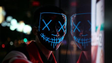 Neon XX Mask Grin in the Night City Glow wallpaper
