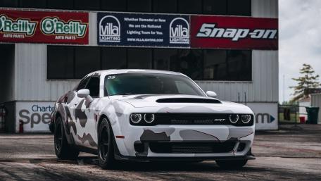 Camouflage Dodge Challenger SRT Hellcat Poised on the Drag Strip wallpaper