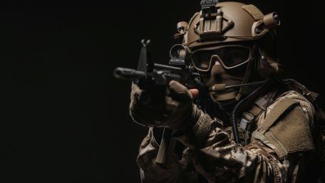 Shadow Ops Infantry Soldier Aiming Rifle on Deep Black Background wallpaper
