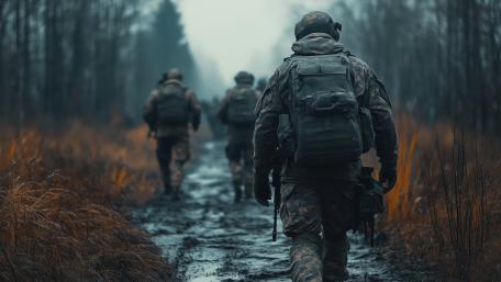Silent Infantry Patrol Through Misty Forest Trail in 8K wallpaper