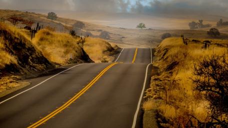 Winding Highway Through Golden Hills of Merced County California wallpaper