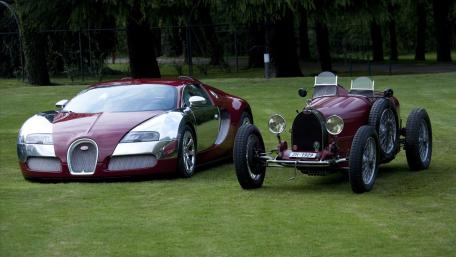 Bugatti Veyron Meets Classic Bugatti Heritage On Lush Green Lawn wallpaper