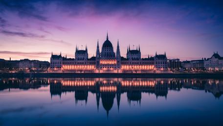 Hungarian Parliament at Dusk Reflected on the Danube in Budapest wallpaper