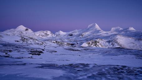 Silent Glacier Peaks Beneath a Violet Blue Hour Winter Sky in 5K wallpaper