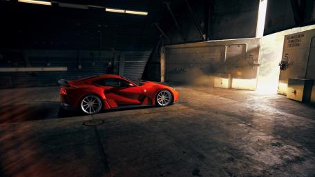 Novitec Ferrari 812 Superfast in Shadowy Industrial Hangar Glow wallpaper