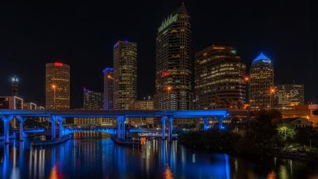 Tampa Night Skyline Reflections Over the Riverwalk Bridge wallpaper
