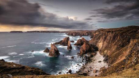 Stormlit Sea Stacks of Mangersta on the Isle of Lewis Coast wallpaper
