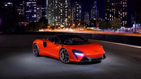 McLaren Artura Glow on Midnight City Streets wallpaper