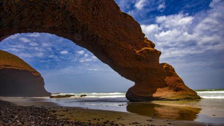 Majestic Sandstone Arch Over Legzira Beach Morocco Atlantic Coast wallpaper