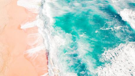 Aerial Turquoise Surf Meeting Blush Sand Beach wallpaper