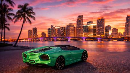 Neon Sunset Skyline with Green Hot Wheels Lamborghini Reventón Roadster wallpaper