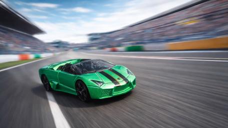 Green Lamborghini Reventón Roadster Model Racing Through the Track wallpaper