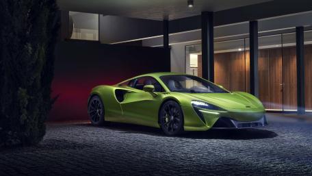 Lime McLaren Artura Supercar Under Modern Night Lights wallpaper