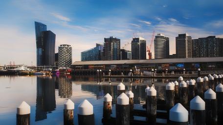 Docklands Melbourne Skyline Reflections Over a Calm Harbor wallpaper