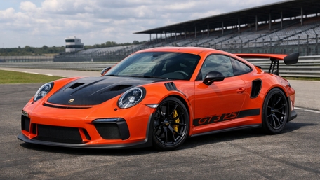 Track Ready Porsche 911 GT3 RS in Vivid Orange wallpaper
