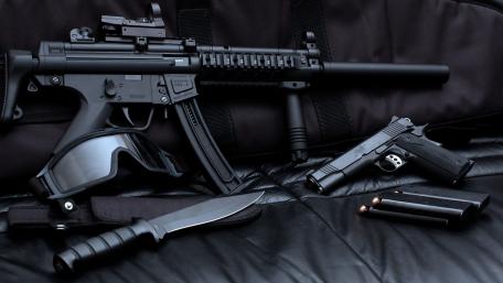 Tactical MP5 Firearm Loadout on Dark Gear Background wallpaper
