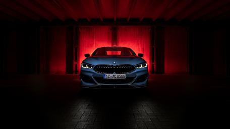 BMW M850i xDrive Coupé in Red Neon Night Glow 4K wallpaper