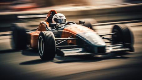 Blazing Formula Racing Speed Through the Apex in Crisp 5K wallpaper